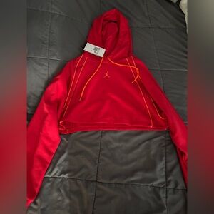 Jordan’s Red Cropped Hoodie with Orange Accents